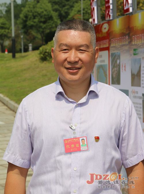 党代会代表钟良贵:做好服务监管两篇文章