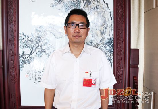 伍恒光:抓重点改革项目 构筑发展新优势